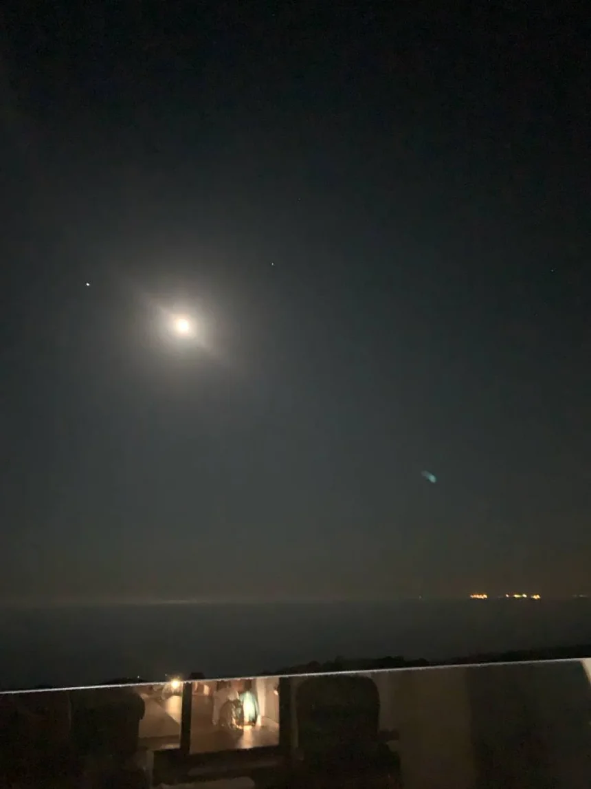 Night sky HDRI reference — moon over coast